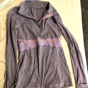 Lululemon woemns size 8 zip up , hands have mitten covers , zip pocket on back